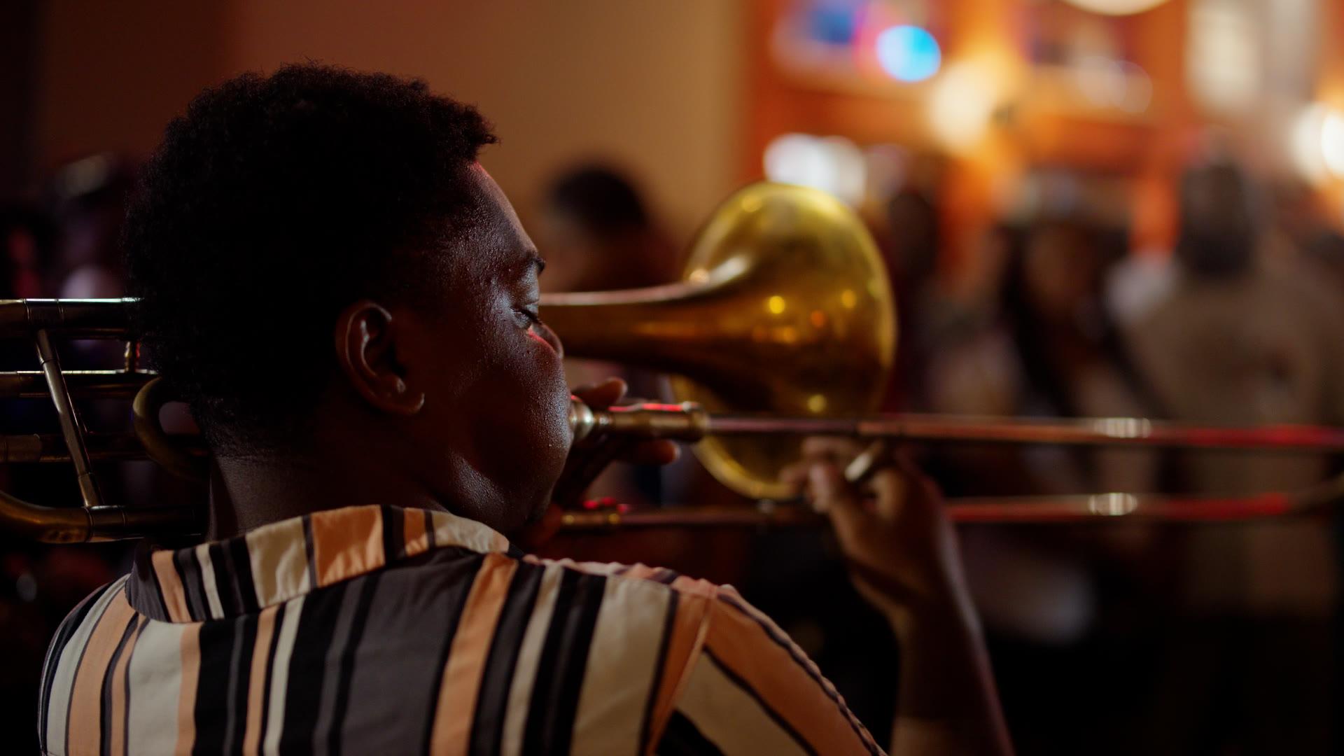 Brass band performing through the streets of New Orleans